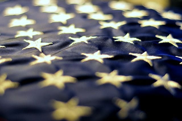 A closeup look of a blue cloth with stars on it